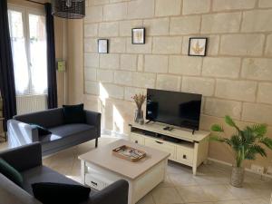 Maisons de vacances Le logis des diligences - Vue sur le chateau : photos des chambres