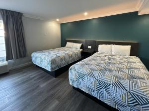 Queen Room with Two Queen Beds - Non-Smoking room in Rodeway Inn Near Maingate Knott's
