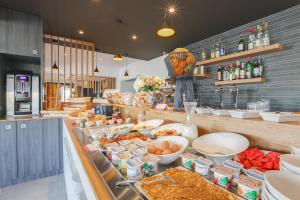 Hotels Brit Hotel Reims La Neuvillette : photos des chambres