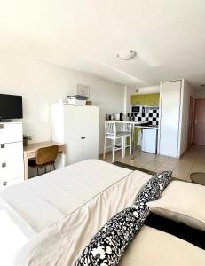 Appartements Studio tout confort : photos des chambres