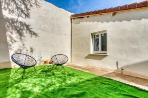 Appartements La Suite Soleil - Maison studio avec jardin prive : photos des chambres