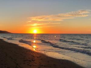 Maisons de vacances Maison les pieds dans le sable : photos des chambres