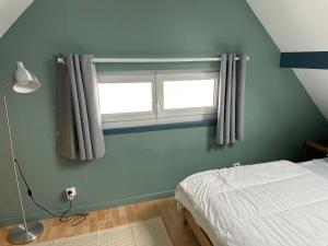 Maisons de vacances Maison les pieds dans le sable : photos des chambres