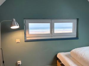 Maisons de vacances Maison les pieds dans le sable : photos des chambres