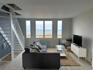 Maisons de vacances Maison les pieds dans le sable : photos des chambres