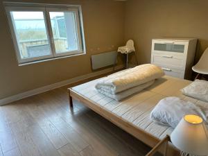 Maisons de vacances Maison les pieds dans le sable : photos des chambres