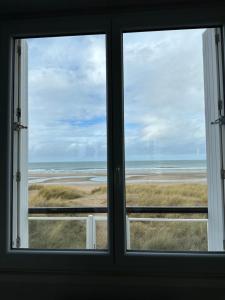 Maison les pieds dans le sable