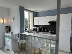 Maisons de vacances Maison les pieds dans le sable : photos des chambres