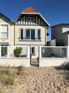 Maisons de vacances Maison les pieds dans le sable : photos des chambres