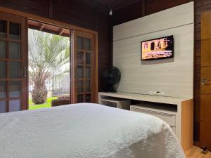 B167 - Casa de Alto Padrão com Piscina Privativa e Espaço Gourmet a 450m do Mar na Praia de Mariscal - Bombinhas-SC