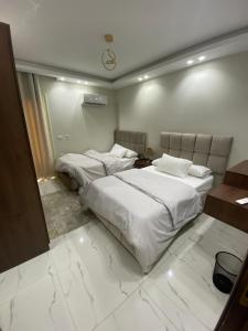 شقه فندقيه حديثه فرش جديد بالمهندسين للإيجار