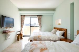 Phòng 3 người có ban công (Triple Room with Balcony)