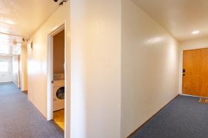 Modern One Bedroom Unit, Sofa Bed, Adjustable Queen Bed, 75 Inch Smart TV and Indoor Secure Parking