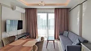 Уютная , комфортабельная двухкомнатная квартира с шикарным видом на море - 梅尔辛