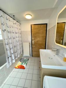 Appartements Appartement cosy au centre-ville avec garage : photos des chambres