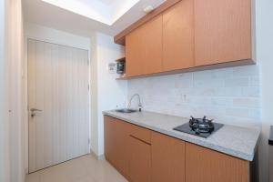 Comfort Living Studio at Grand Kamala Lagoon Apartment By Travelio