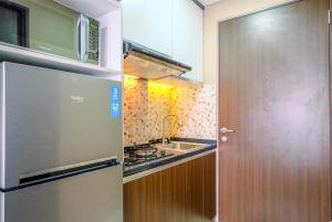 Comfortable and Modern Studio Transpark Cibubur Apartment By Travelio