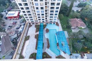 Modern Retreat with Pool and Gym near Yaya Center