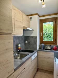 Appartements Sapins 11 - Appartement familial - Pied des pistes - Vue sur les montagnes : photos des chambres