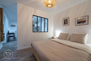 Appartements T1 bis tout confort centre historique : photos des chambres