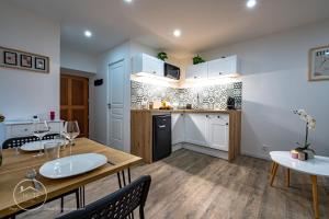 Appartements T1 bis tout confort centre historique : photos des chambres