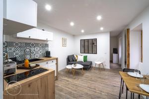Appartements T1 bis tout confort centre historique : photos des chambres