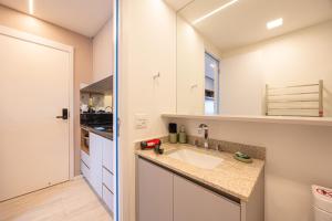 EQS - Residencial Quad Studios Campo Belo by Anora Spaces