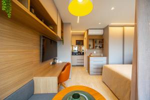 EQS - Residencial Quad Studios Campo Belo by Anora Spaces