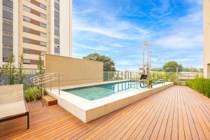 EQS - Residencial Quad Studios Campo Belo by Anora Spaces