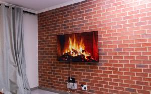 7 Elizabeth Place - Beautiful self catering 1 bedroom unit next to Kyalami Racetrack with free WiFi - swimming pool gym and restaurant - Perfect for a couple in Midrand Waterfall