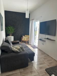 Casa em Florianópolis no bairro de Canasvieiras com sacada e churrasqueira!