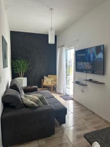 Casa em Florianópolis no bairro de Canasvieiras com sacada e churrasqueira!