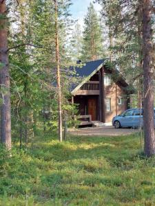 Kotoisa hirsihuvila Ylläksellä