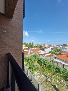 Flat Belo Mar - apto novo com varanda e vista mar