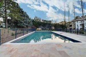 Appartements Appartement moderne - Terrasse - Piscine - Parking : photos des chambres