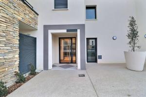 Appartements Appartement moderne - Terrasse - Piscine - Parking : photos des chambres