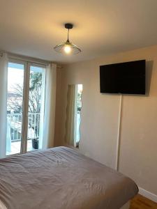 Appartements Magnifique appartement surequipe-balcon-vu-parking : photos des chambres