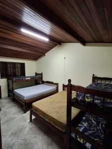 Linda casa a poucos metros da praia 098