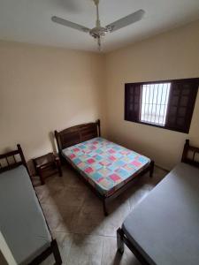 Linda casa a poucos metros da praia 098