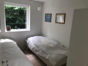 In The Charming Coastal Town Of Rågeleje, This Lovely Holiday Home Is Located