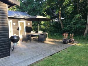 In The Charming Coastal Town Of Rågeleje, This Lovely Holiday Home Is Located