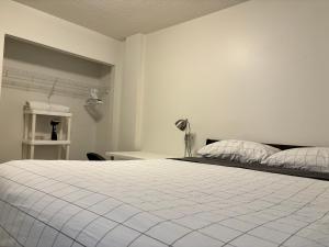 7th Floor 1-Bedroom Condo with Parking