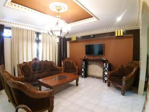 Villa kota bunga puncak bogor ada AC, karoke , water heater, wifi