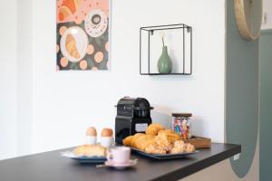 Appartements Agape by Kleidos -Disney a 10min, T2 , 4P, Parking gratuit et terrasse : photos des chambres