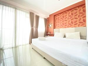Comfy 1BR at Gateway Pasteur Apartment By Travelio