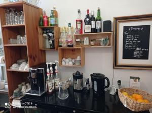 Appartements Chambre atypique dans cafe healthy : photos des chambres