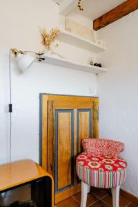 Appartements Chambre atypique dans cafe healthy : photos des chambres