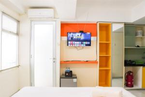 Comfy Studio Apartment at Jarrdin Cihampelas By Travelio