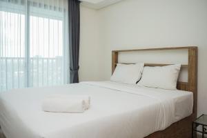 Nice and Homey Studio at Bintaro Embarcadero Apartment By Travelio