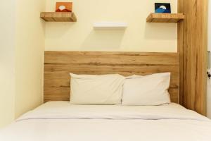 Cozy Living and Tidy 1BR Meikarta Apartment By Travelio